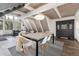 Bright dining area with large windows, a stylish table, and cozy seating, perfect for entertaining at 6365 Highway 9, Breckenridge, CO 80424