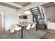 Dining area featuring a view to the kitchen and stylish seating, and adjacent to the staircase at 6365 Highway 9, Breckenridge, CO 80424