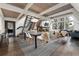 Open-concept dining room with stairs and an A-frame ceiling at 6365 Highway 9, Breckenridge, CO 80424