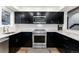 Well-equipped kitchen featuring stainless steel appliances and modern cabinets, perfect for cooking enthusiasts at 6365 Highway 9, Breckenridge, CO 80424