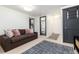 Spacious living room with comfortable seating and easy bathroom access at 6365 Highway 9, Breckenridge, CO 80424