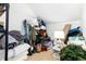 Overstuffed storage room with boxes, winter sports equipment, and various household items at 6365 Highway 9, Breckenridge, CO 80424