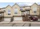 Well-maintained townhome exteriors, each with private garages and inviting front entrances at 1747 High Plains Ct, Superior, CO 80027