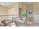 A cozy home office space featuring a desk, comfortable seating, and ample natural light for productivity at 1747 High Plains Ct, Superior, CO 80027