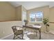 Bright home office space with a window view, a desk, and decorative accents for a productive work environment at 1747 High Plains Ct, Superior, CO 80027