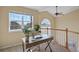 A comfortable and well-lit home office featuring a large window and stylish desk and chair at 1747 High Plains Ct, Superior, CO 80027