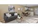 Cozy living room flowing into dining area, with modern furnishings and natural lighting at 1747 High Plains Ct, Superior, CO 80027