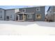 Backyard of the home featuring covered patio at 1385 Bloom St, Brighton, CO 80601