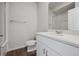 Clean bathroom features a white vanity, sink, and shower with glass door at 1385 Bloom St, Brighton, CO 80601