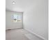 Bedroom featuring carpet, neutral paint, and a single window at 1385 Bloom St, Brighton, CO 80601