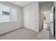 Cozy bedroom with plush carpeting, a window for natural light, and a closet at 1385 Bloom St, Brighton, CO 80601