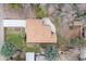 Aerial view shows a single-Gathering home, driveway, landscaping, and a detached shed in the backyard at 3230 Vance St, Wheat Ridge, CO 80033