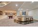 Finished basement with pool table and stylish bar area with seating at 6234 Nautique Cir, Larkspur, CO 80118