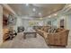 Spacious finished basement featuring recessed lighting, large couch, and space for entertaining at 6234 Nautique Cir, Larkspur, CO 80118