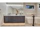 Modern bathroom featuring marble countertops, a soaking tub, and a separate shower at 6234 Nautique Cir, Larkspur, CO 80118