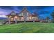 Stunning home with stone accents and a spacious deck, offering breathtaking views and outdoor living space at 6234 Nautique Cir, Larkspur, CO 80118