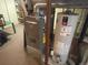 Basement with water heater and furnace at 14828 E Pacific Pl, Aurora, CO 80014