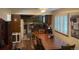 Spacious kitchen/dining area combo with bright light and plentiful seating at 14828 E Pacific Pl, Aurora, CO 80014