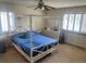Primary bedroom with queen-sized bed, shuttered windows, and nice natural light at 14828 E Pacific Pl, Aurora, CO 80014