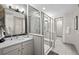 Elegant bathroom with double vanity and large shower at 6020 N Orleans St, Aurora, CO 80019
