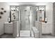 Spa-like bathroom with double sinks and walk-in shower at 6020 N Orleans St, Aurora, CO 80019