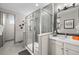 Modern bathroom with walk-in shower and stylish fixtures at 6020 N Orleans St, Aurora, CO 80019