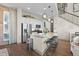 Modern kitchen with stainless steel appliances and an island at 6020 N Orleans St, Aurora, CO 80019