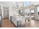 Modern kitchen with island and stainless steel appliances at 6020 N Orleans St, Aurora, CO 80019