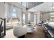 Open living area with large windows and modern decor at 6020 N Orleans St, Aurora, CO 80019