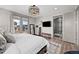 Main bedroom with ensuite bathroom and access to balcony at 6020 N Orleans St, Aurora, CO 80019