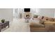 Finished basement with a brick fireplace, and comfortable sectional, perfect for entertaining or relaxation at 2900 Clermont St, Denver, CO 80207