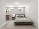 Bright bedroom showcases neutral tones, two windows, and a modern desk creating a peaceful and functional space at 2900 Clermont St, Denver, CO 80207
