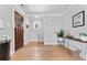 Bright foyer features hardwood floors and elegant decor, showcasing a welcoming entryway at 2900 Clermont St, Denver, CO 80207
