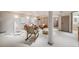 Bright living room featuring modern furniture, a teepee, and a rocking chair at 17522 E Dewberry Dr, Parker, CO 80134
