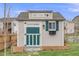 Charming storage shed with a painted door, window box, and lots of storage space at 17522 E Dewberry Dr, Parker, CO 80134