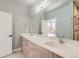 Bathroom featuring double sinks, large mirror and modern finishes at 1284 Stuart St, Denver, CO 80204