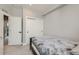 Bright bedroom features soft carpet, closet and adjacent door at 1284 Stuart St, Denver, CO 80204