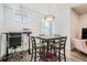 Bright dining area featuring a modern light fixture and stylish furniture at 1284 Stuart St, Denver, CO 80204