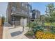 Modern townhouse complex featuring a brick facade, metal accents, and well-maintained landscaping at 1284 Stuart St, Denver, CO 80204