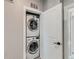Convenient laundry closet with stacked washer and dryer at 1284 Stuart St, Denver, CO 80204