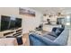 Living room featuring modern decor with a view into the kitchen at 1284 Stuart St, Denver, CO 80204