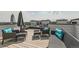Enjoy city views from this rooftop deck with stylish patio furniture at 1284 Stuart St, Denver, CO 80204