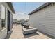 Modern rooftop deck with fire pit, offering space for entertaining at 1284 Stuart St, Denver, CO 80204