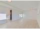 A spacious basement featuring recessed lighting, bright white walls and tile floors at 1430 Lashley St, Longmont, CO 80504