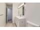 Modern bathroom featuring a sleek vanity, and a clean and bright aesthetic at 1430 Lashley St, Longmont, CO 80504
