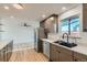 Modern kitchen featuring stainless steel appliances, sleek countertops, and stylish cabinetry at 1430 Lashley St, Longmont, CO 80504