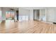 Spacious living room featuring hardwood floors, ample natural light, and an open concept design at 1430 Lashley St, Longmont, CO 80504