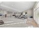 Expansive basement with bar, seating, and plenty of space for entertaining at 3485 Park Ridge Rd, Sedalia, CO 80135