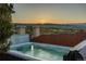 Relaxing hot tub with stunning sunset mountain views, perfect for unwinding after a long day at 3485 Park Ridge Rd, Sedalia, CO 80135