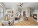 Spacious living room with hardwood floors, modern furnishings, and seamless flow into other living spaces at 3485 Park Ridge Rd, Sedalia, CO 80135